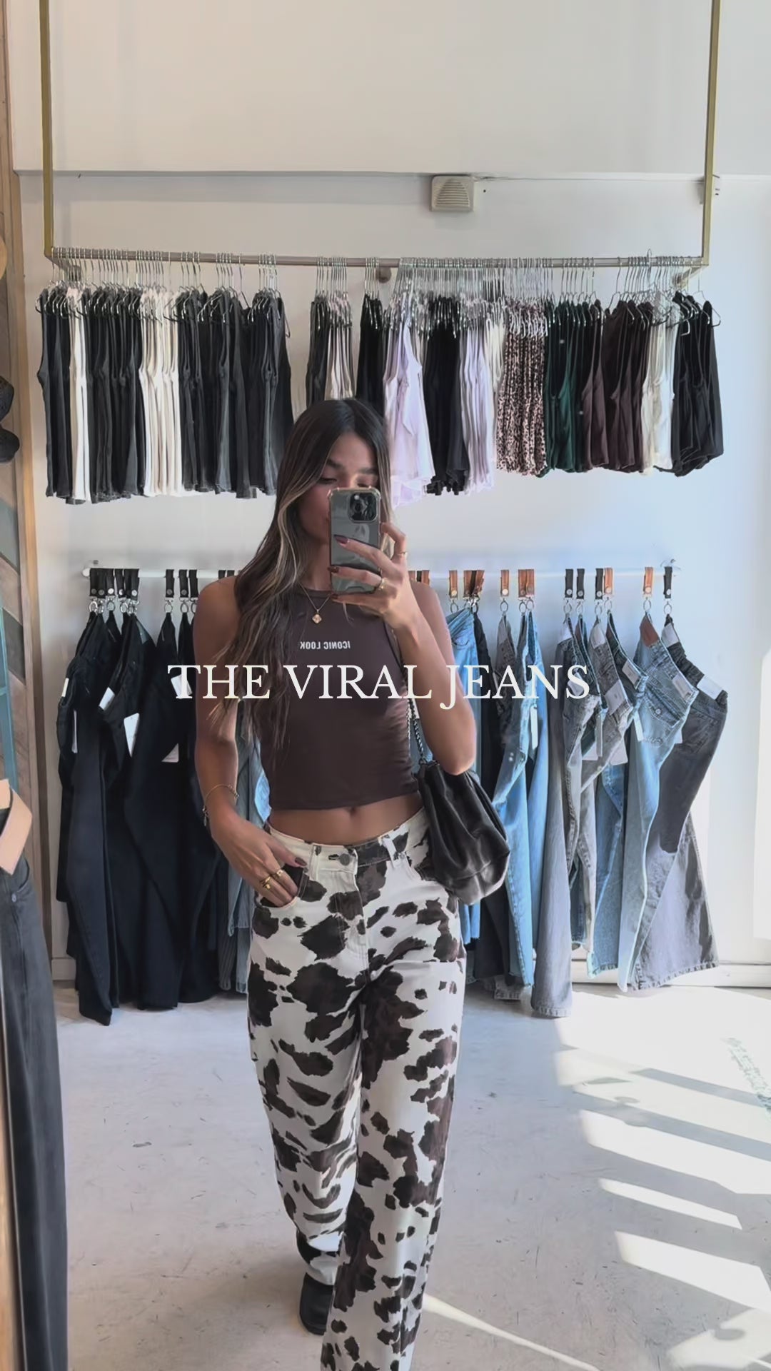 High-Rise Relaxed Cow Print Jeans video